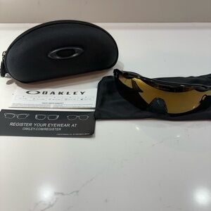Oakley Black Frame with Gold Lens Sunglasses